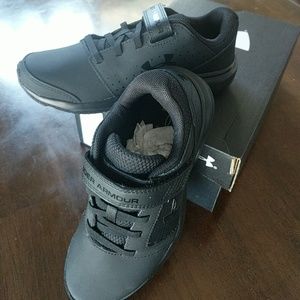 Brand new, never worn boys under armour shoes